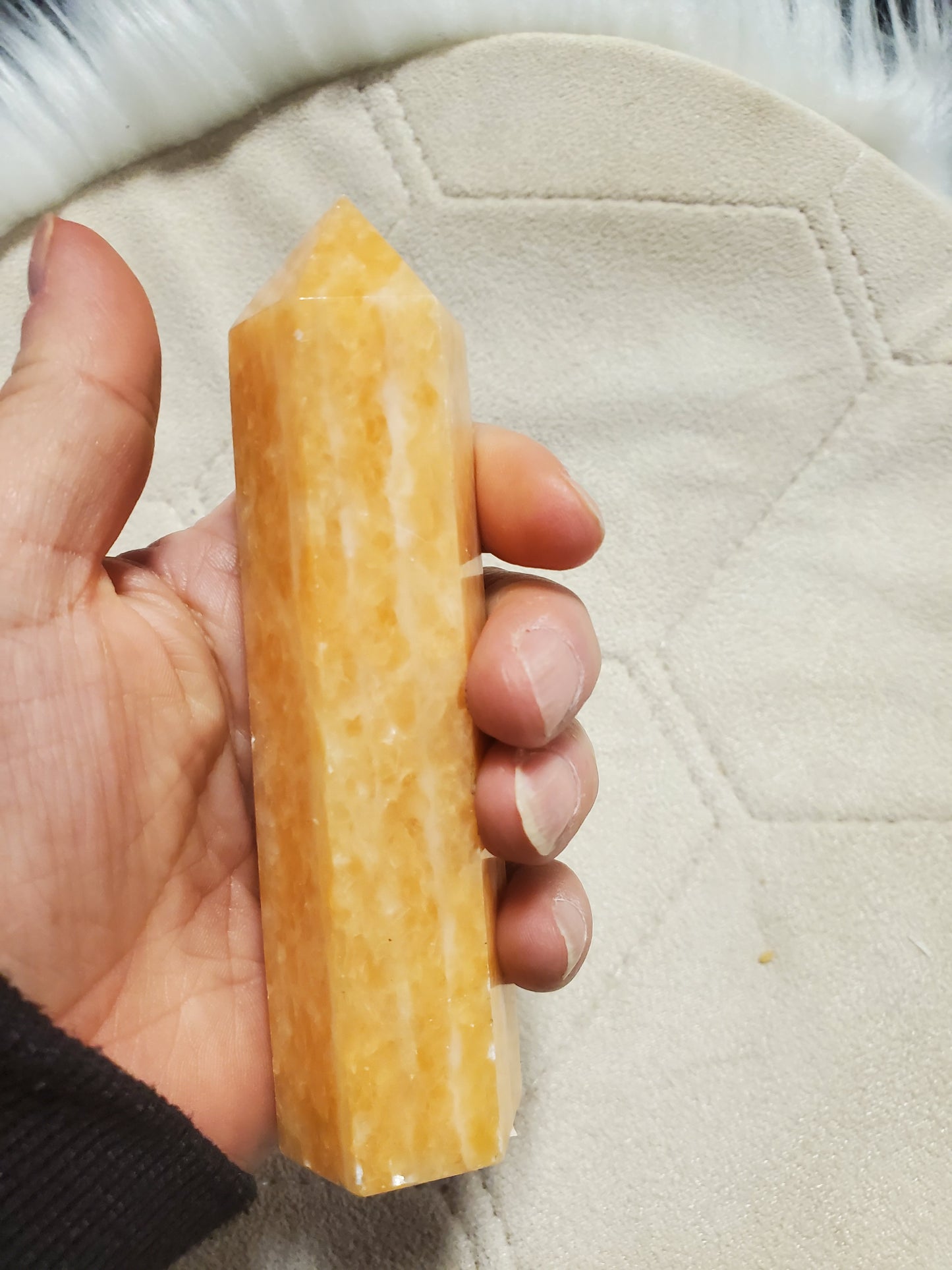 Orange calcite point