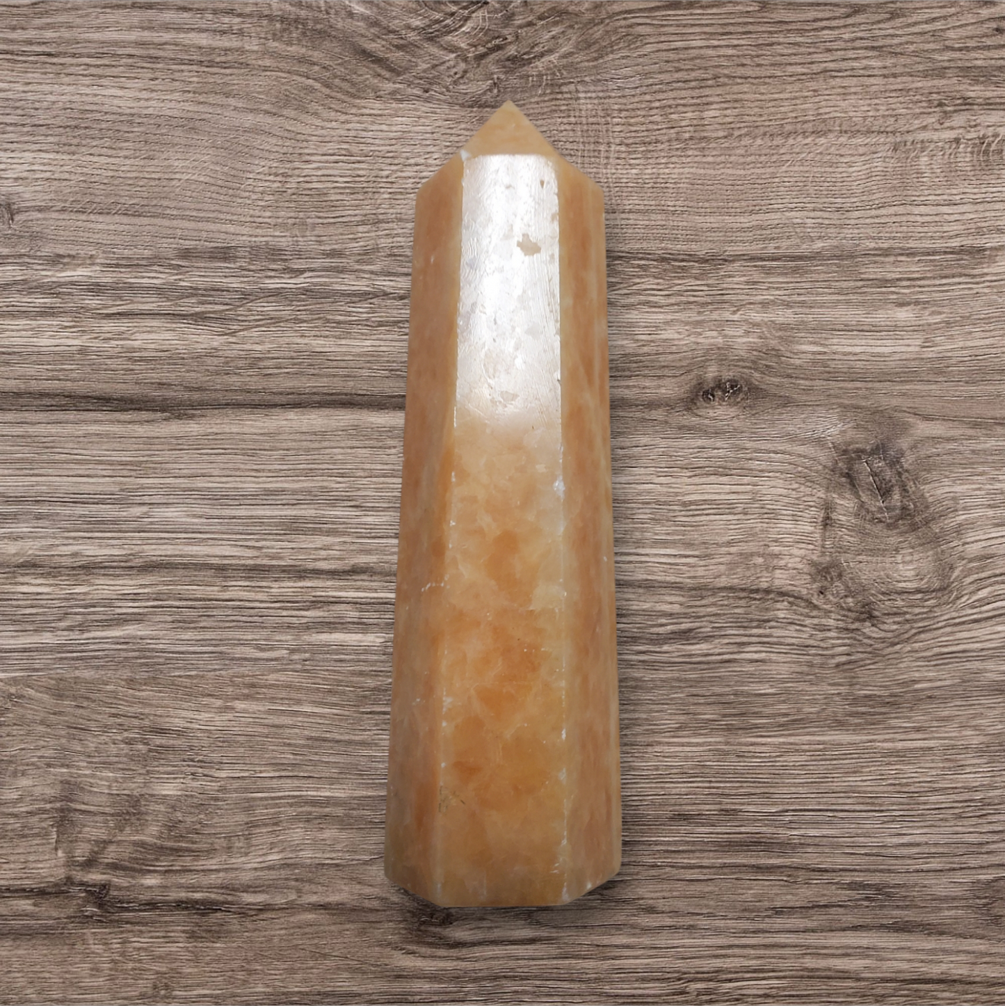 Orange calcite point