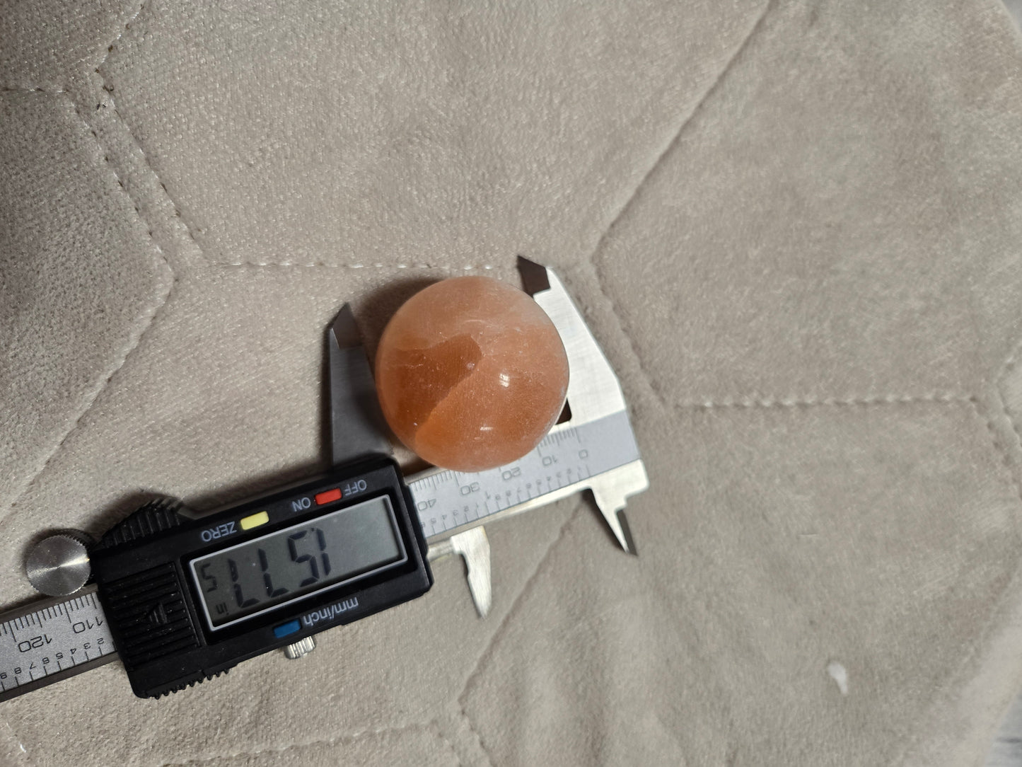 Peach selenite sphere