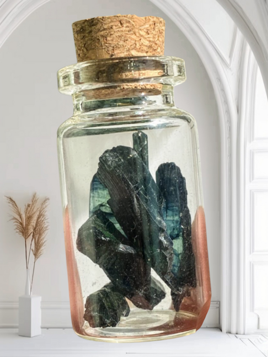 Vivianite specimen in jar